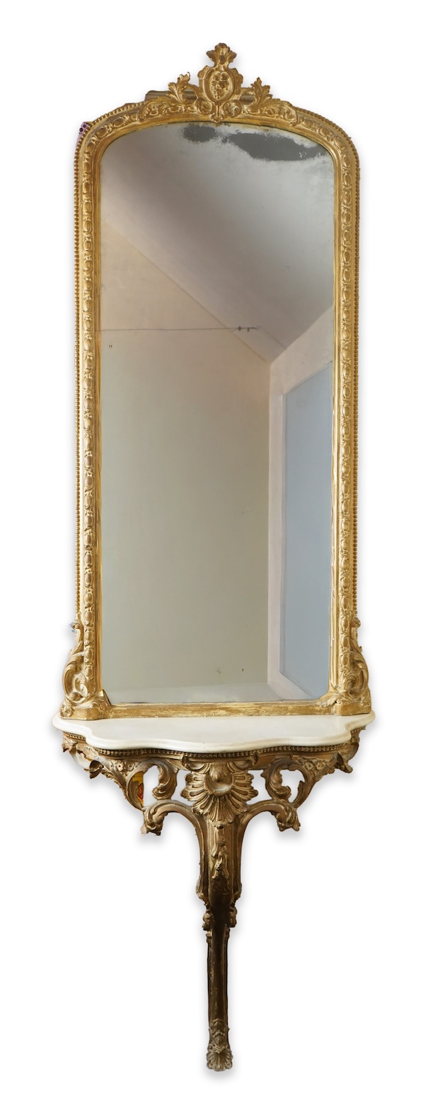 A Victorian giltwood and composition white marble top serpentine console table and pier mirror